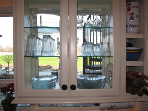 Cabinet Made to Fit around Window with Glass Shelves